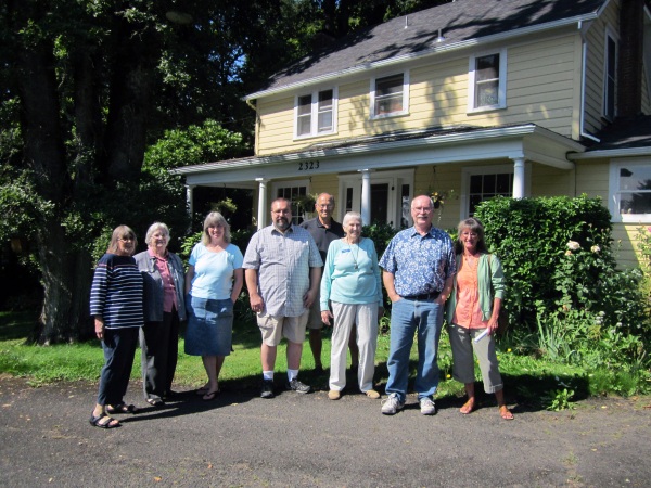 Photo of OLHD members and host Pascale Steig standing in fron of the Isabelle Rupert House, Saturday September 14th, 2013