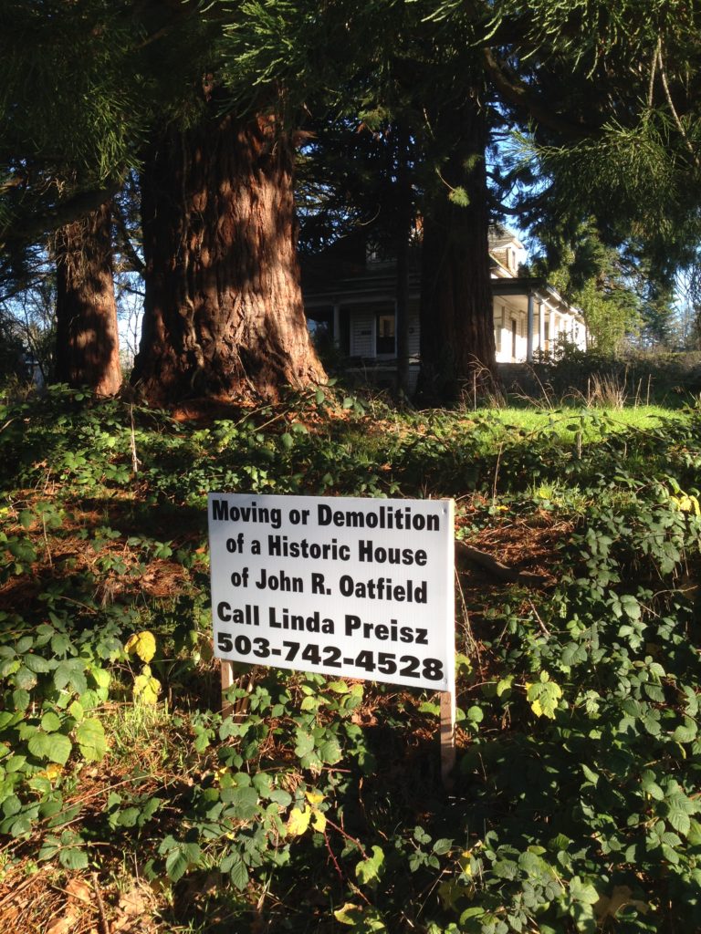 Photo of Phil Oatfield house and Demolition Notice sign